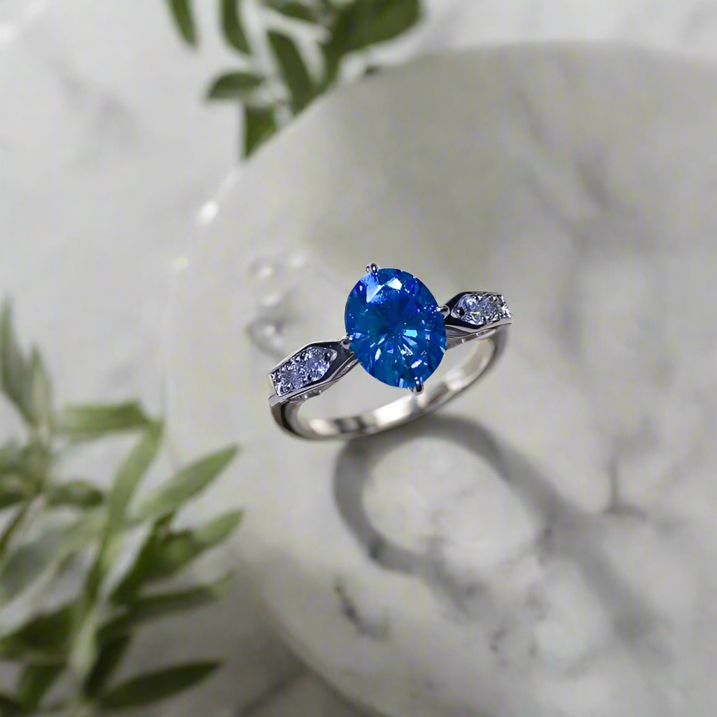 AuroraLuxe™ – 2-Carat Blue Moissanite & 18K Gold-Plated Silver Ring