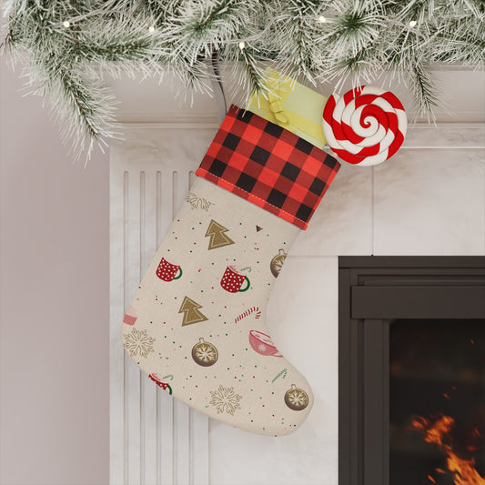 Christmas stocking with festive design hanging by a fireplace
